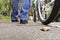 Low angle of a man with his bicycle