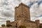 Low angle shot of an ancient medieval castle in Nogales, Extremadura, Spain