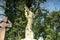 Low angle shot of an angel memorial statue on a grave in Nunhead cemetery London in England