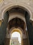 Low angle shot of the arches of a historic building in Cordoba, Spain