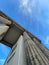 Low angle shot of the beautiful Brandenburg Gate under the blue cloudy sky in Berlin, Germany