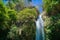 Low angle shot of a beautiful waterfall in Rincon de la Vieja National Park in Costa Rica