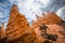 Low angle shot of the breathtaking rock formations under the blue sky in Bryce National Park, USA