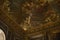 Low angle shot of ceiling painting in Hercules room of Royal Chateau Versailles, Paris, France