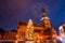 Low angle shot of the colorful fireworks on the church on a starry evening