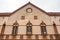 Low angle shot of the former Benedictine Monastery\\\'s triangle roof in Tuscany, Italy