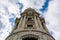 Low angle shot of Metropolis building in Madrid under white cloudy sky