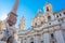 Low angle shot of Navona Square and the detail of the statue of the Four Rivers in Rome, Italy