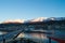 Low angle shot of a port, buildings, and mountains in Ushuaia, Argentina