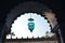 Low angle shot of an unusual lamp hanging by the mosque\\\'s entrance in Hugli-Chuchura, India