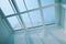 Low-angle shot of a white rooftop window of a house