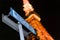 Low angle of a sign against the Tokyo Tower illuminated at night in Japan