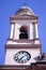 Low angle vertical shot of the bell tower of the Montevideo Metropolitan Cathedral in Uruguay