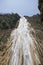 Low angle vertical shot of a mesmerizing waterfall Cascadas el Chiflon located in Mexico