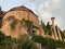 A low-angle view of ancient ruin of Tempio di Romolo. Ancient Temple-Basilica at The Roman Forum, Italy