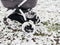 Low angle view of baby stroller carriage with bassinet in the snow field with