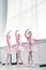 low angle view of beautiful little ballerinas dancing