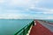 Low angle view of Bedok Jetty Singapore reaching into the sea