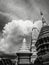 Low angle view of buddhist pagoda rising up into dramatic cloudy sky