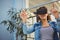 Low angle view of businesswoman enjoying augmented reality headset at office