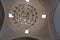 Low angle view of dome inside the mosque and ancient style chandelier