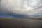 Low angle view of empty road under stormy dramatic sky