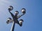 Low angle view of lamp at Plaza de Zocodover, against blue sky.