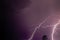 Low angle view of lightning on the purple sky - perfect for wallpapers