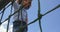 Low angle view of mixed-race schoolgirl playing in school playground on a sunny day 4k