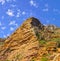 Low angle view of a mountain peak in South Africa. Scenic landscape of a remote hiking location on Lions Head in Cape