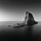 Low angle view of natural landmark The stone ships near Sinemorets, Bulgaria. Black and white landscape of rocks in calm sea water