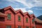 low angle view of red wooden houses in Flam village Aurlandsfjord