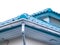 Low angle view, roof corner of a house with gutters