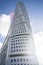 Low angle view of the Turning Torso under a blue sky and sunlight in Malmo in Sweden