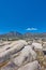 Low angle view of the Twelve Apostles mountain range in South Africa against a blue sky. Closeup of rocky landscape