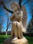 Low angle of vintage stone statue of angel