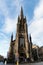 Low angle wide vertical shot of Tolbooth Kirk in Edinburgh, Scotland