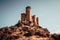 Low angles shot of the ruins of the medieval Castle of Pelegrina, Spain