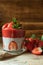 Low Carb Strawberry and chia puddings in a glass, wood background