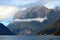 Low cloud and tall ship on Milford Sound, New Zealand