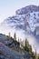 Low clouds above pine trees, Lake O\'Hara, Yoho National Park, Ca