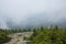 Low clouds obscure the valley below the Mt. Kearsarge summit