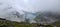 Low clouds over the Lunersee in the Ratikon Alps during a hike across Austria and Switzerland.