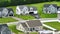 Low-density two story private homes in rural residential suburbs outside of Rochester, New York. Upscale suburban houses