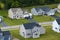 Low-density two story private homes in rural residential suburbs outside of Rochester, New York. Upscale suburban houses