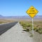 Low flying aircraft sign on highway.