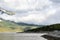 Low hanging clouds over mountainside coastlines in scenic Skagway, Alaska