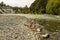 Low level shot of a fast flowing shallow river,  Rangitikei River in New Zealand