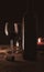 Low light Romantic ambiance wine bottle and wine glasses with candle light