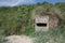 Low Newton, UK - A pill box on the beach at Low Newton, Northumberland